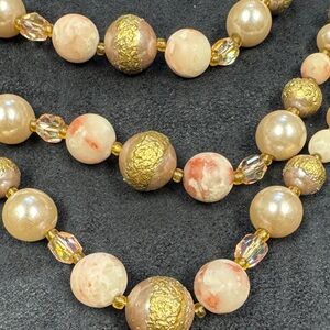 Vintage pink and gold beads with small chyrstal beads